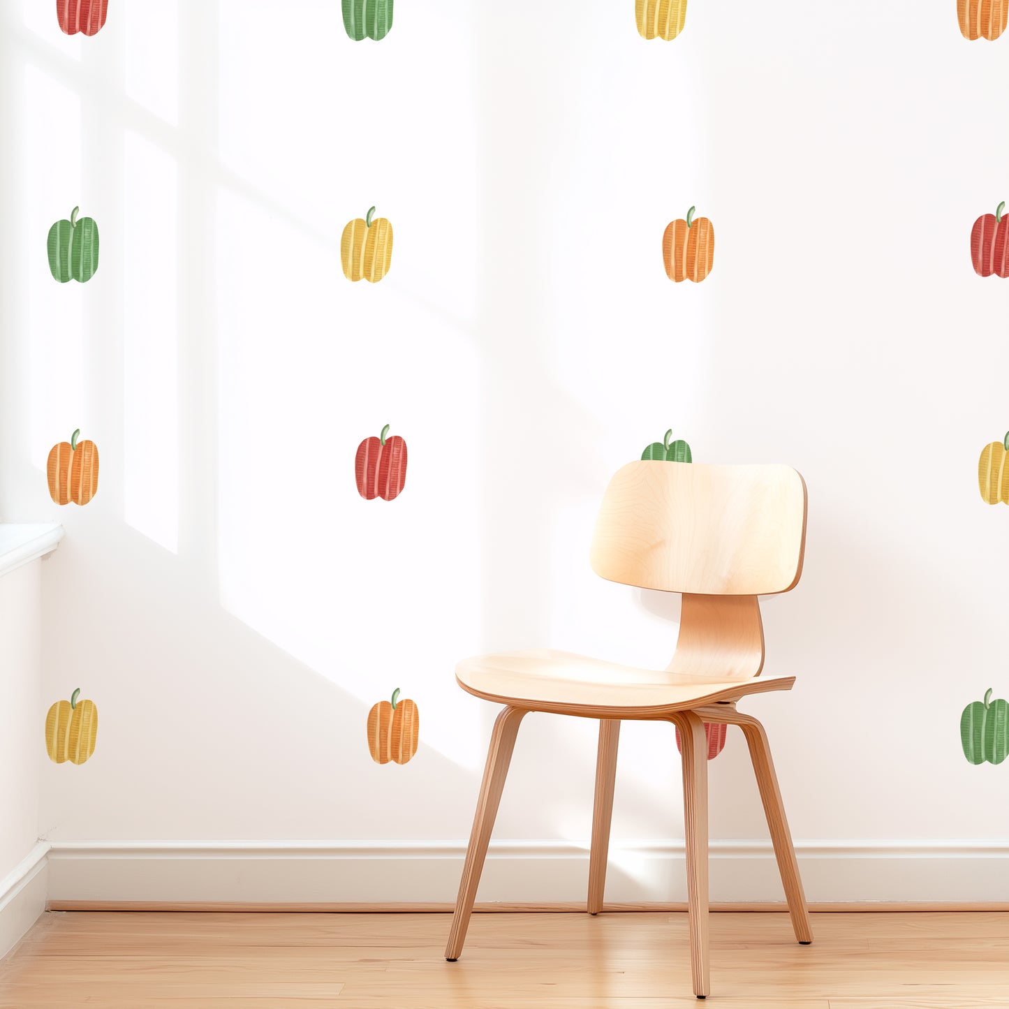 Bright and cheerful space with bell pepper wall decals styled in evenly spaced grid and modern wood chair
