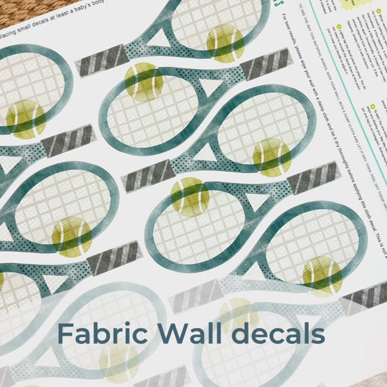 Load and play video in Gallery viewer, Step-by-step guide of how to install Mej Mej’s peel-and-stick removable fabric wall decals featuring watercolor tennis rackets. Perfect for sports-themed decor for tennis fans.
